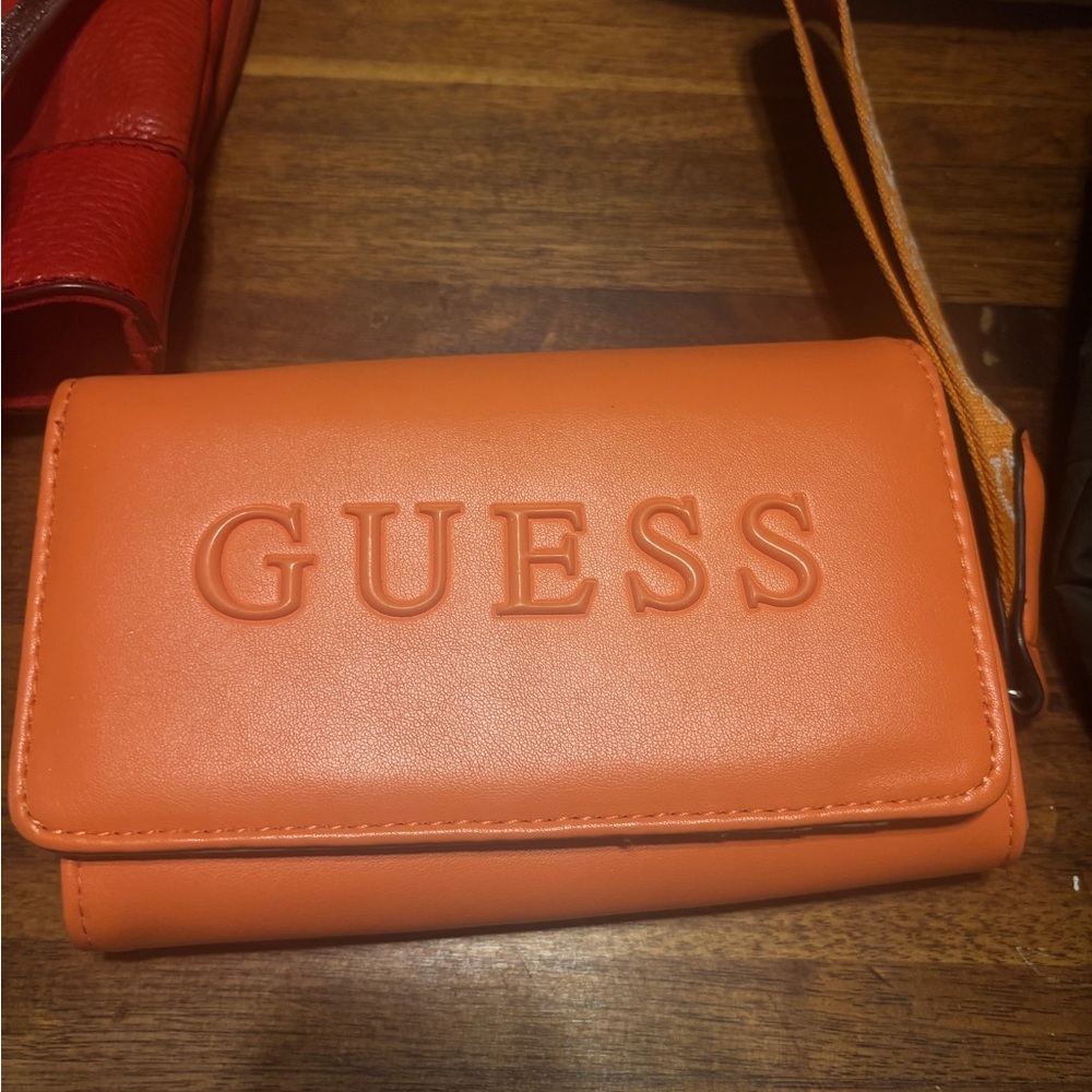 GUESS Orange Wristlet Wallet with Embossed Logo